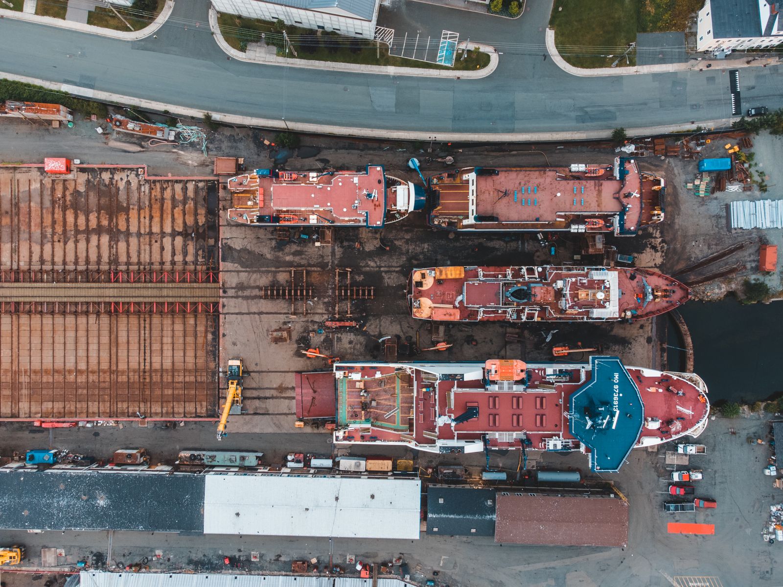 Aerial view of vessels under construction in a shipyard